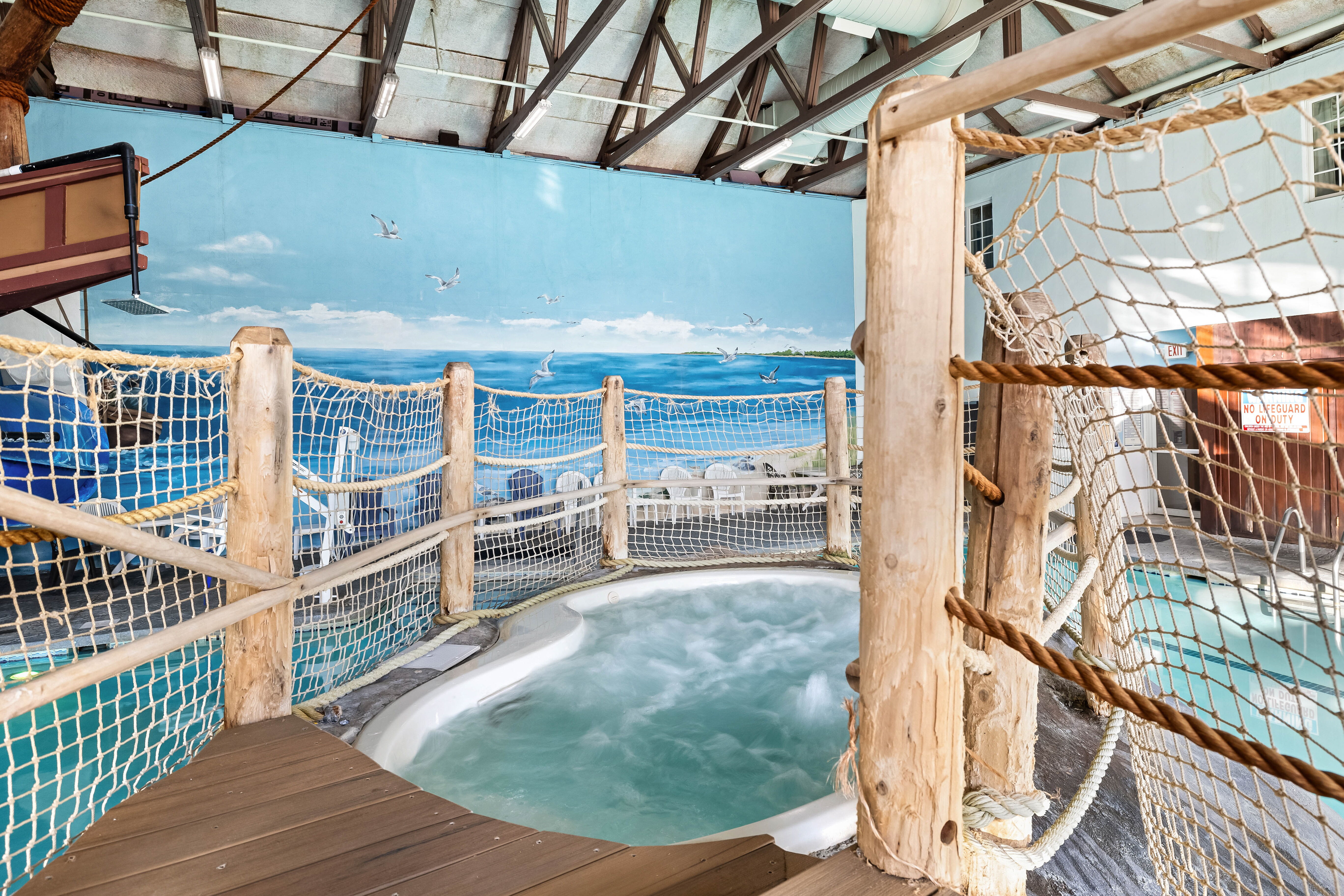 The Pilgrim Cove theme pool with hot tub at the John Carver Inn and Spa in Plymouth MA
