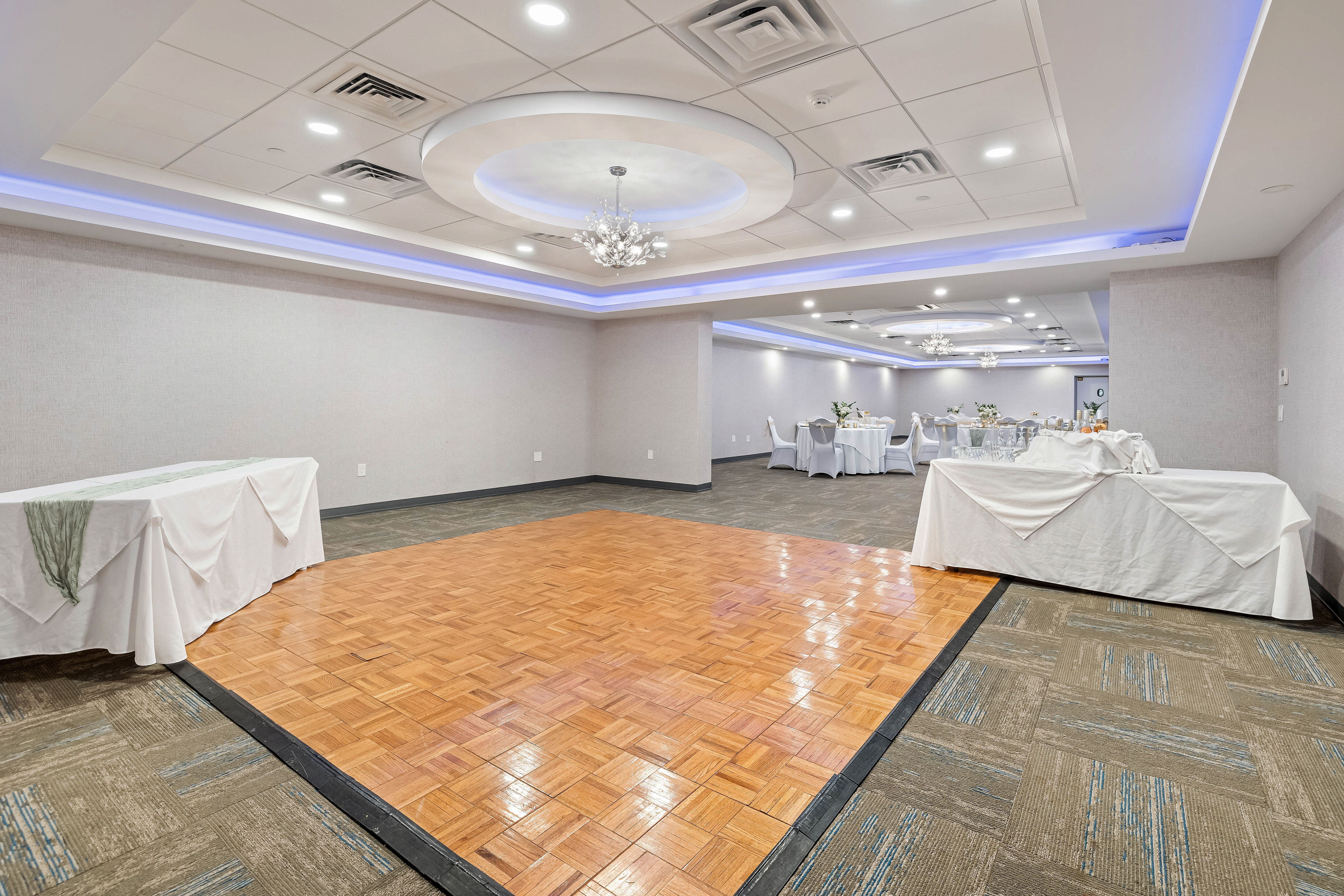 Banquets and Events at the John Carver Inn & Spa - A fully set event room with dance floor