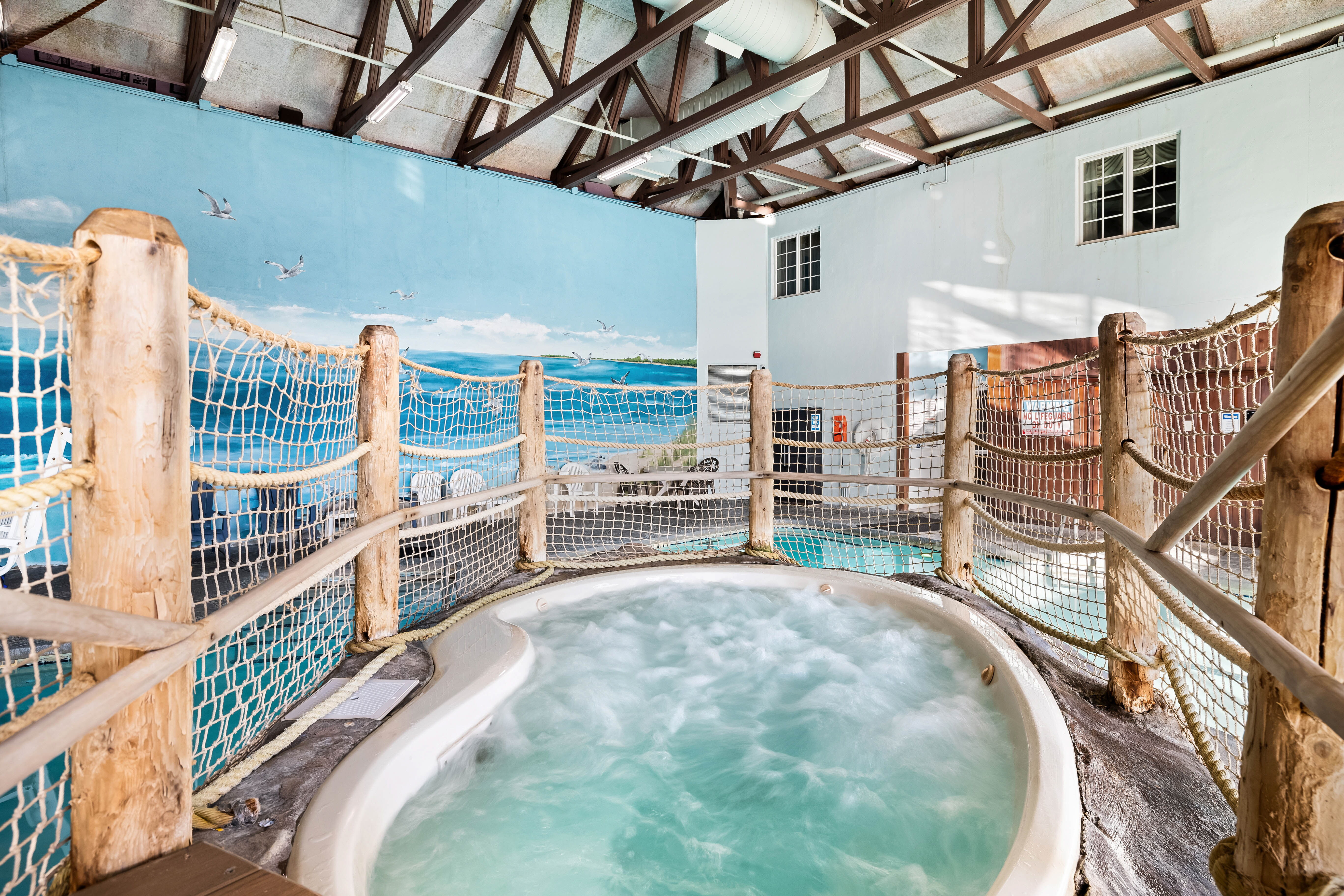 The Pilgrim Cove theme pool with hot tub at the John Carver Inn and Spa in Plymouth MA