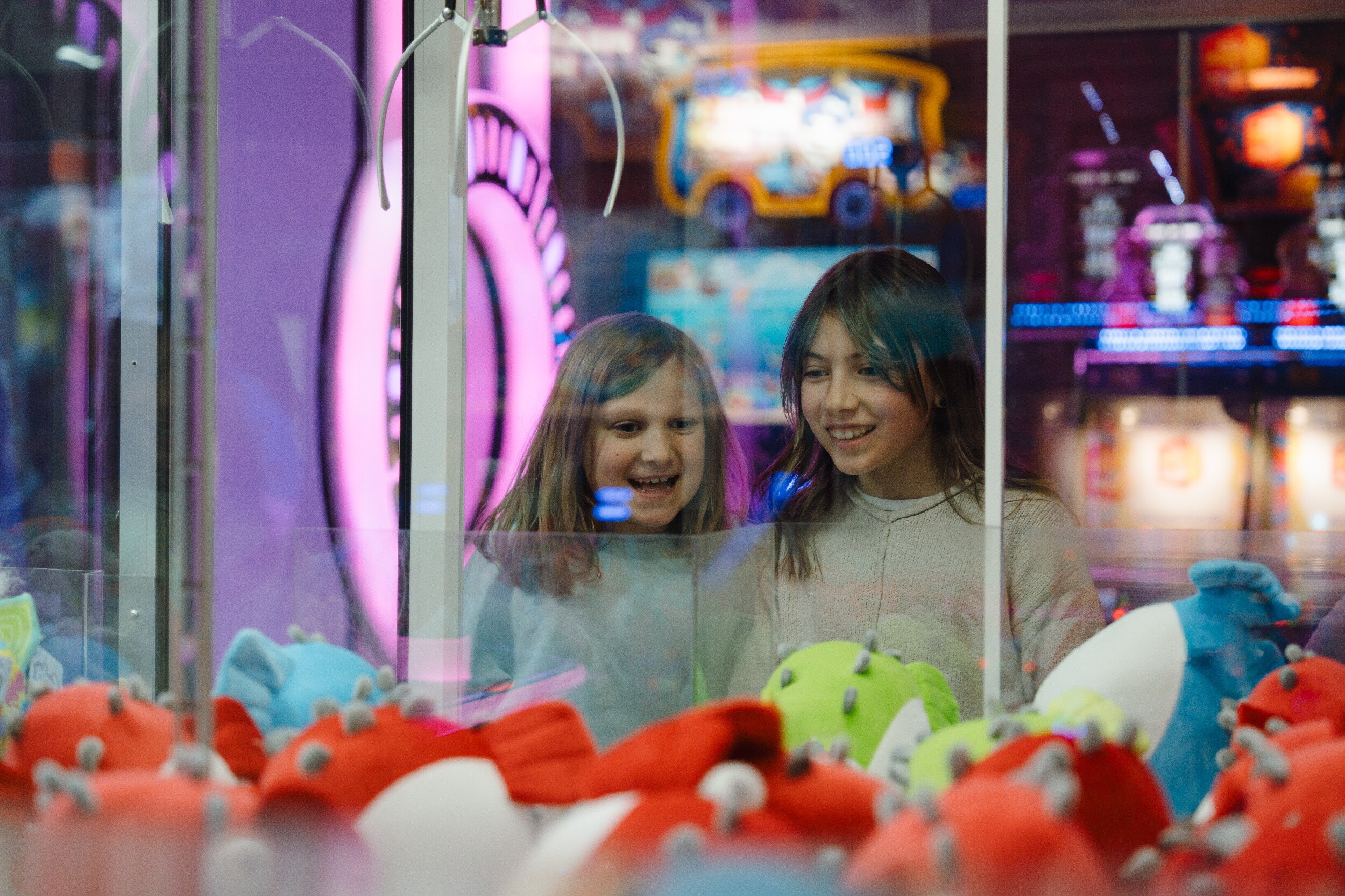 Two children enjoy the arcade at the John Carver Inn and Spa in Plymouth MA