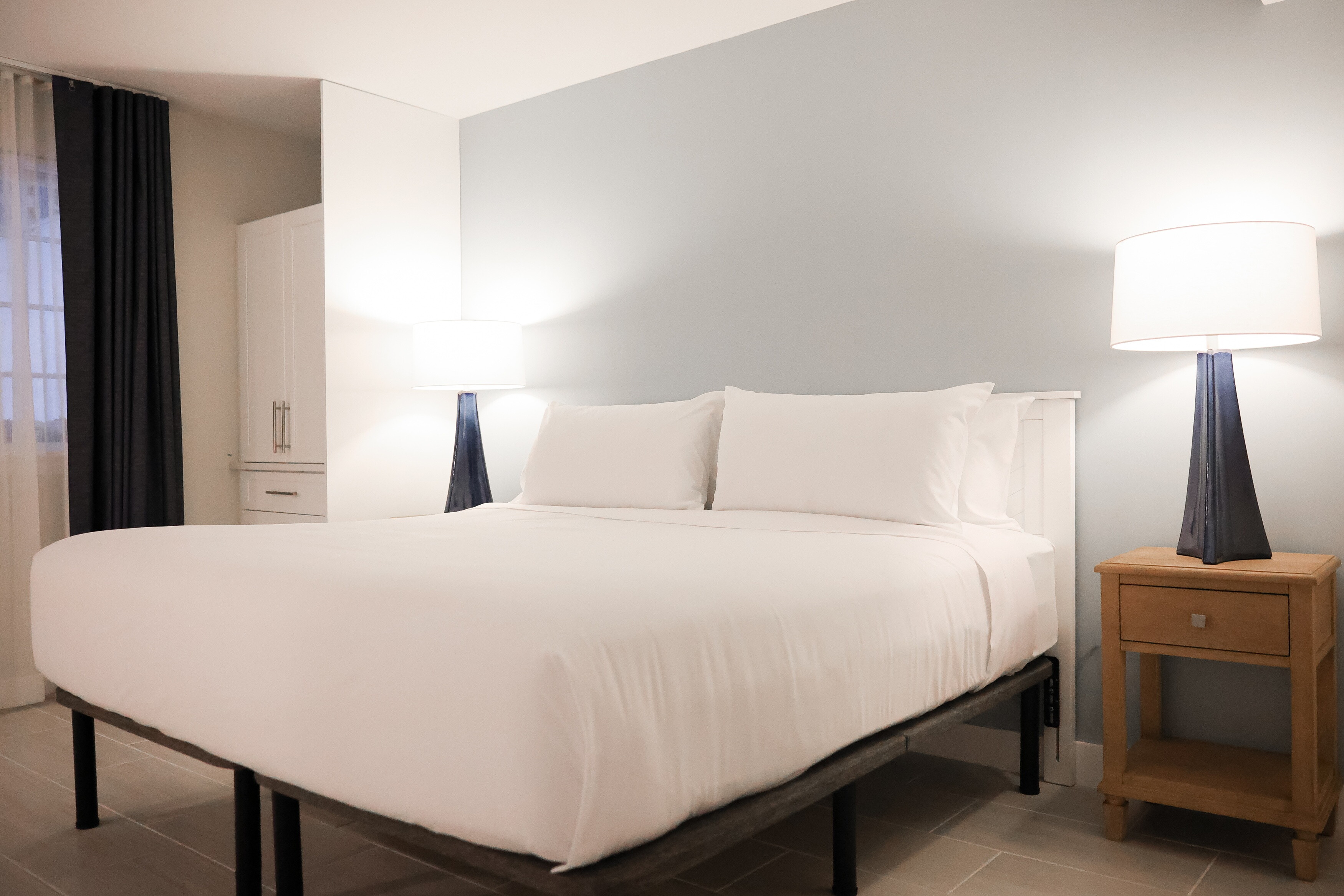 A comfortable bed in the fireplace suite at the John Carver Inn & Spa in Plymouth MA